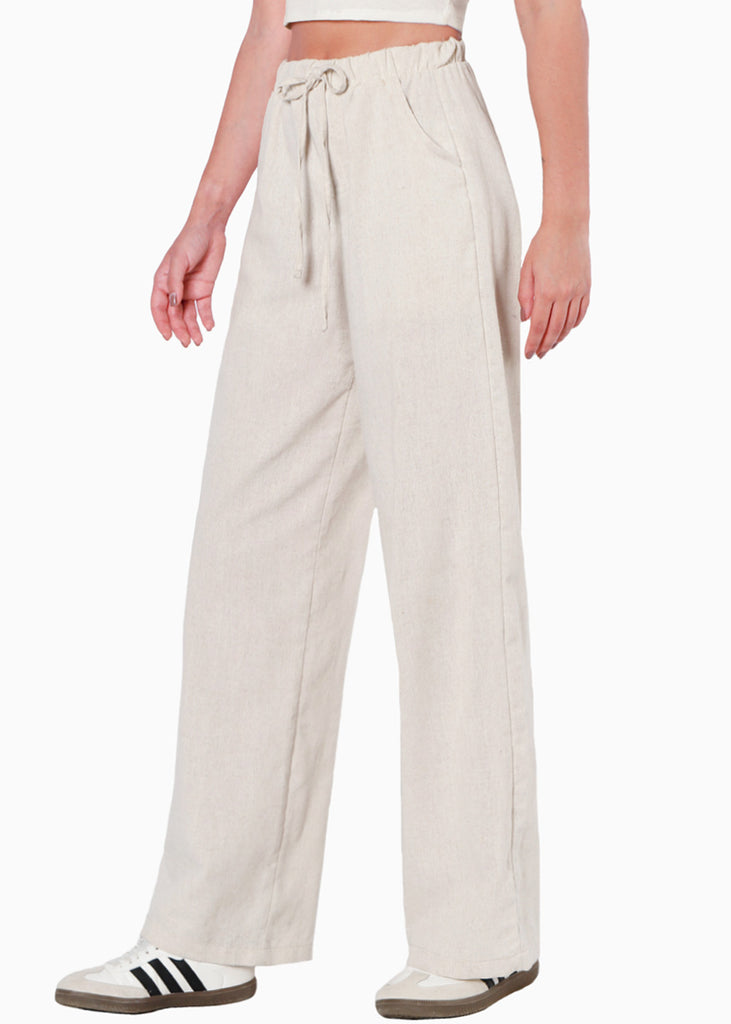 Pantalón recto tipo lino con elástico en cintura y anudado color beige para mujer - Flashy